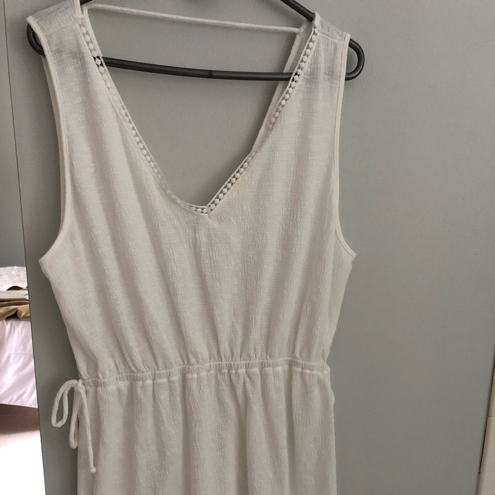White swimsuit cover up.